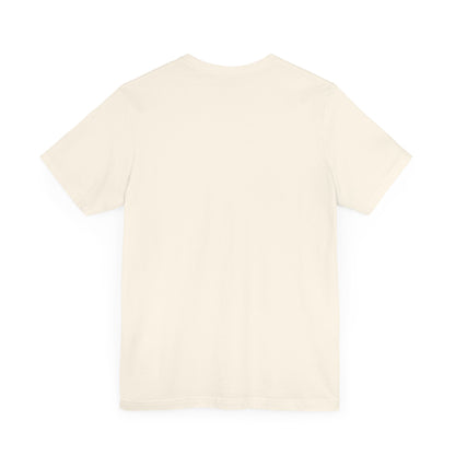 T-Shirt mit 'Actin Up' in Lasso-Schrift und Illustration einer reitenden Frau auf Pferd in der Wüste – Western-Style Design