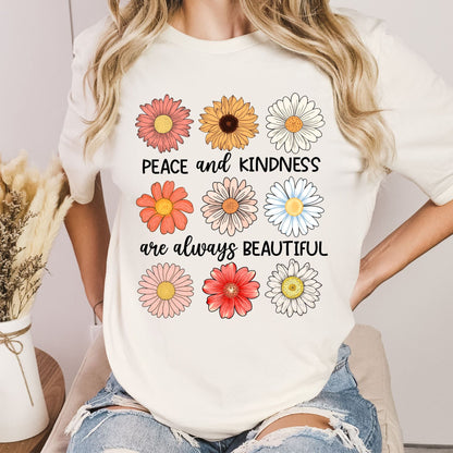 T-Shirt mit Aufschrift 'Peace & Kindness' und Blumenmotiv – feminines Statementshirt für Damen